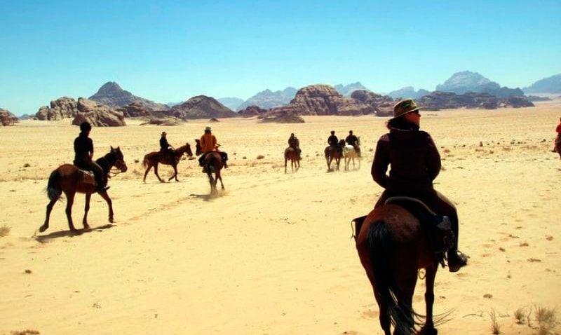 Horseback riding through the desert - Jordan