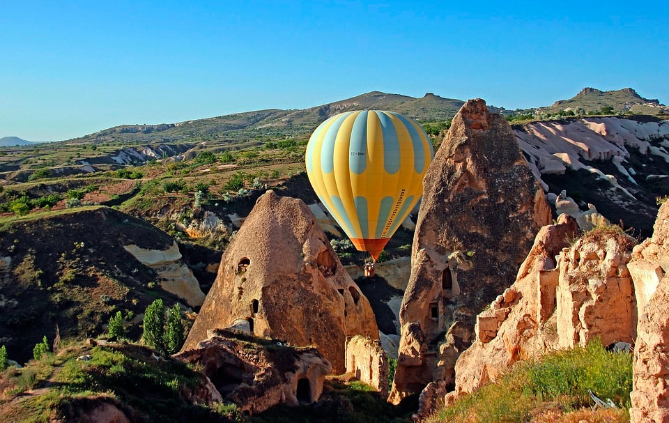 Hot air balloon between the mountains of Turkey.
