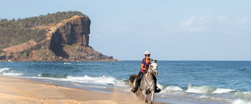 Riding on the beach